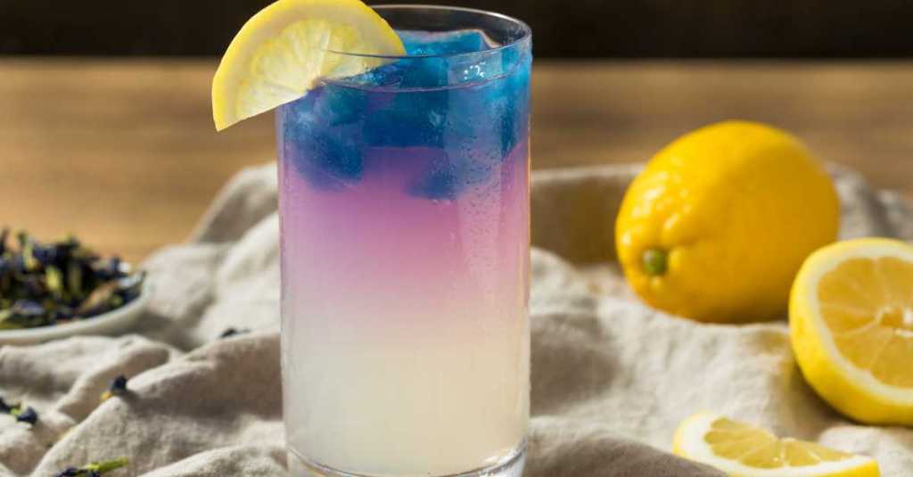 A blue cocktail created with butterfly pea flower, ideal for color-changing drinks.