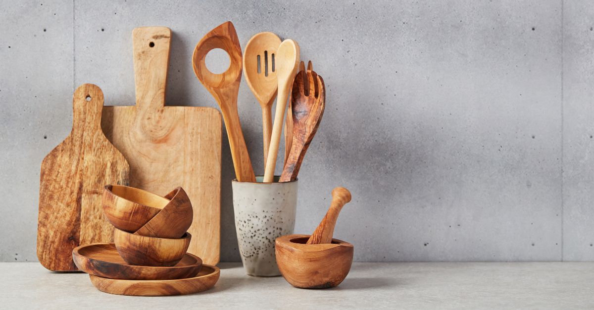 top-kitchen-utensils-wooden-spoons-cutting-boards-mortar