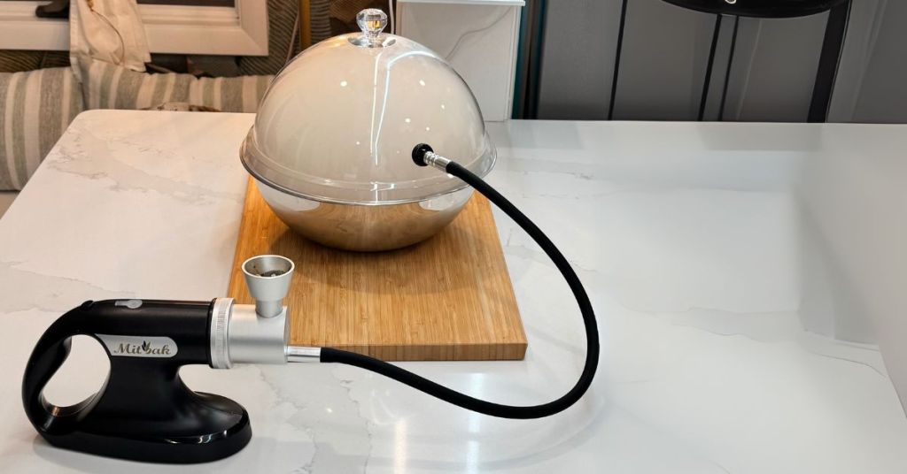 Using a smoking gun to infuse dishes with smoky flavors, perfect for beginners.